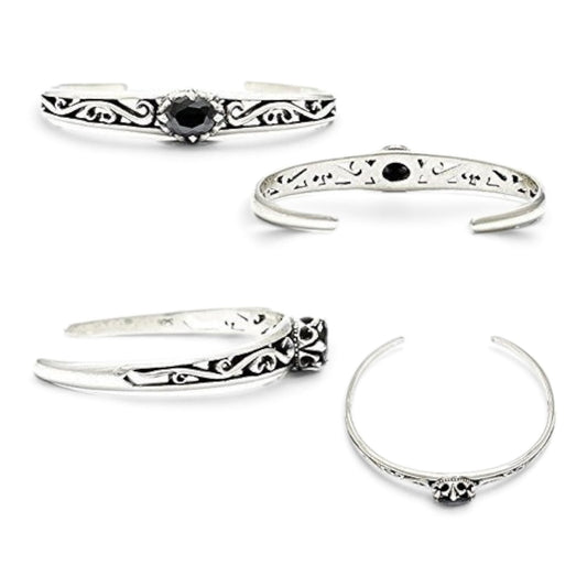 Truelements Jewelry sterling silver bangle featuring an arabesque crown design and a central black zirconia stone.