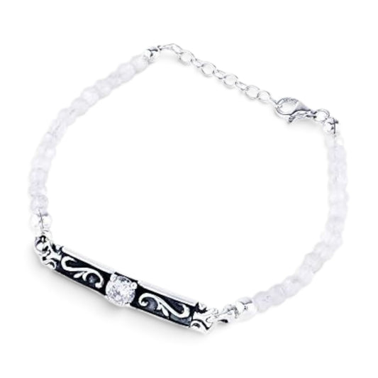 Truelements Jewelry sterling silver bracelet featuring an arabesque center piece, rainbow moonstone, and clear zirconia