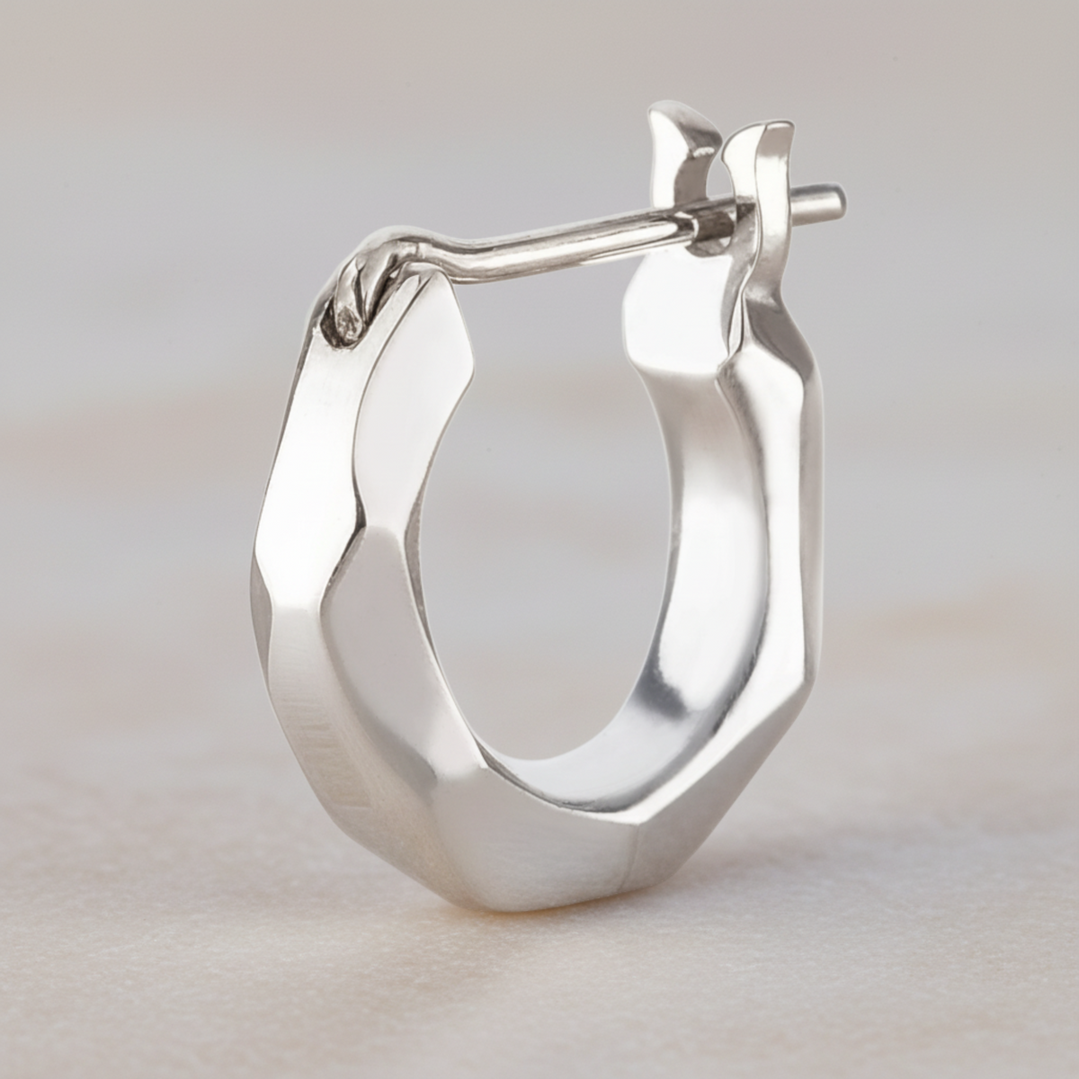 Truelements Jewelry sterling silver 925 hoop earring for men with a faceted, polished mirror finish design.