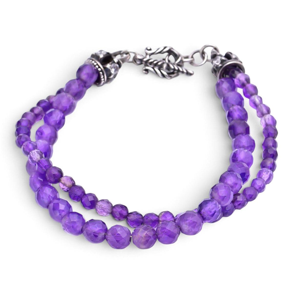 Truelements Jewelry men's bracelet featuring 6mm and 4mm natural amethyst beads, purple zirconia, and oxidized silver.