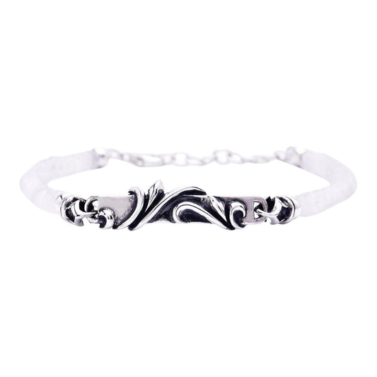 Truelements Jewelry sterling silver bracelet featuring an arabesque design and 4mm rainbow moonstone beads.