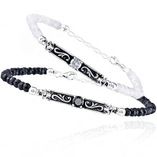 Truelements Jewelry couple pair bracelets in sterling silver with arabesque patterns, black spinel, and moonstone.
