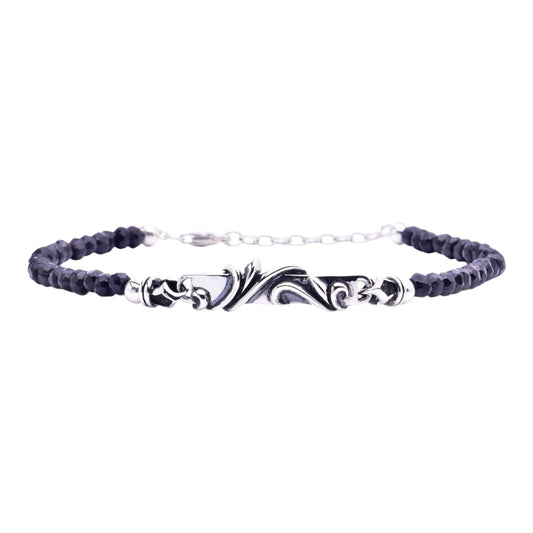 Truelements Jewelry men's bracelet featuring 4mm black spinel beads and an oxidized sterling silver arabesque plate.