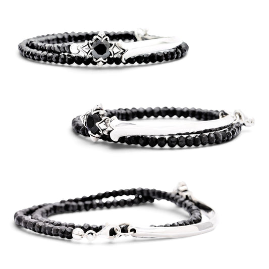 Truelements Jewelry men's bracelet featuring 4mm black spinel beads, a silver 925 cross, and black cubic zirconia.