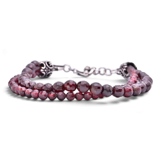 Truelements Jewelry men's bracelet featuring faceted red garnet beads, antique silver 925 accents, and red zirconia.