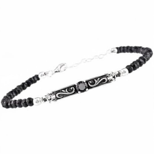 Truelements Jewelry men's bracelet featuring a sterling silver arabesque center piece with black spinel and zirconia.