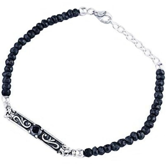 Truelements Jewelry men's bracelet featuring black spinel beads, a silver 925 arabesque center piece, and zirconia.
