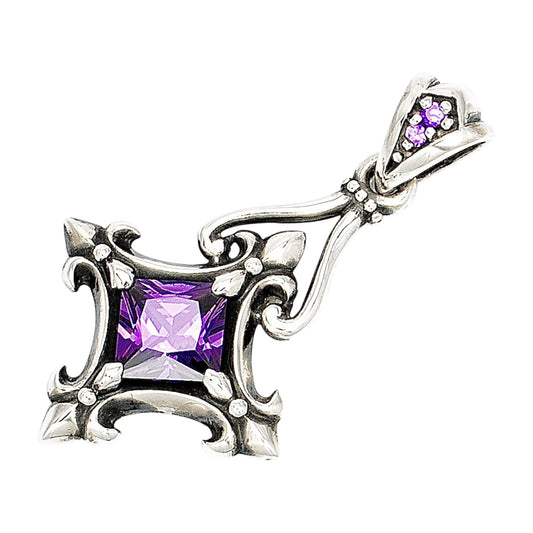 Truelements Jewelry sterling silver Byzantine cross pendant featuring a large purple cubic zirconia and fleur-de-lis.