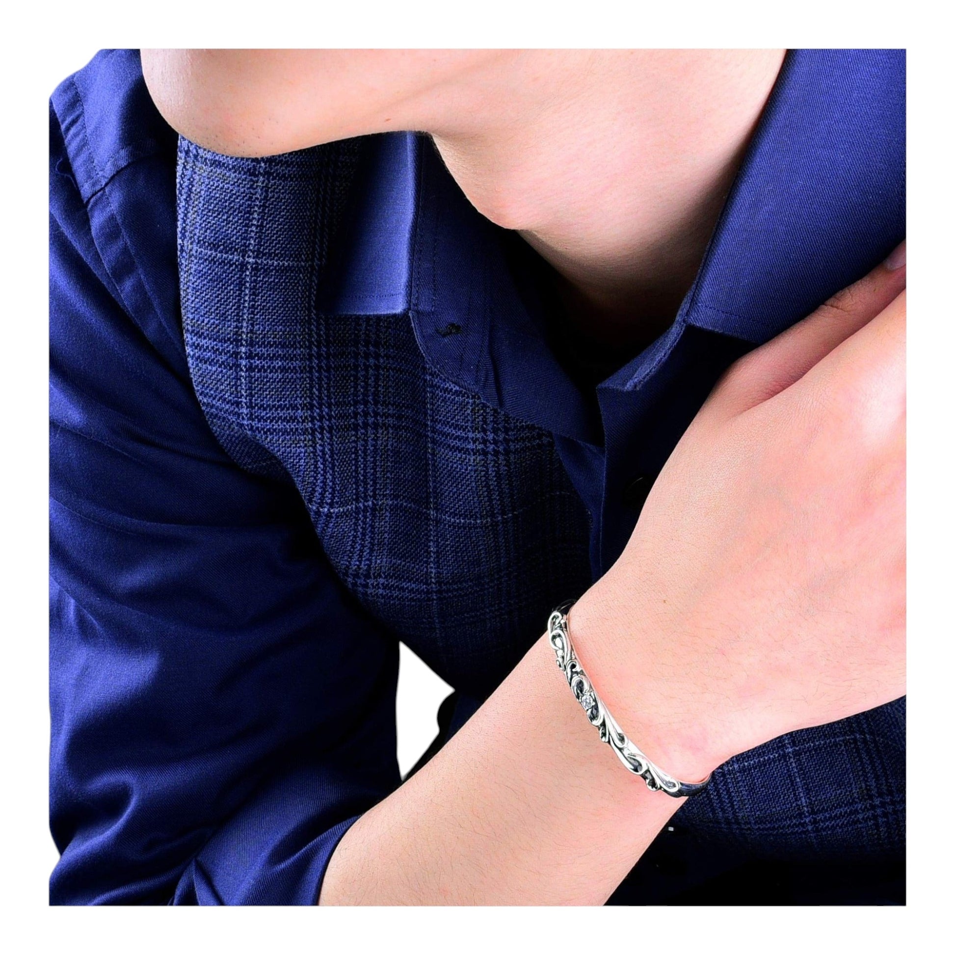 Truelements Jewelry men's sterling silver bangle with arabesque engraving, oxidized finish, and clear cubic zirconia.