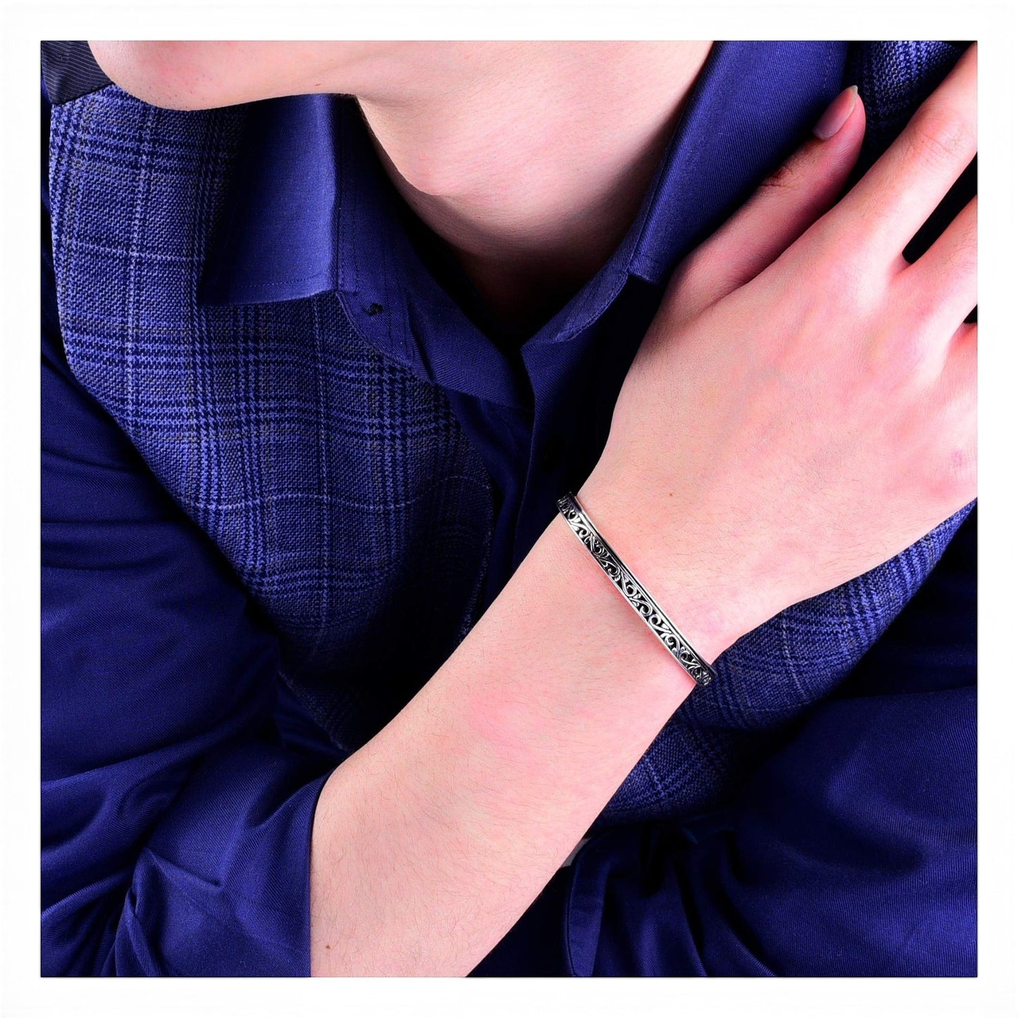 Truelements Jewelry sterling silver men's bangle featuring intricate arabesque filigree with an oxidized finish