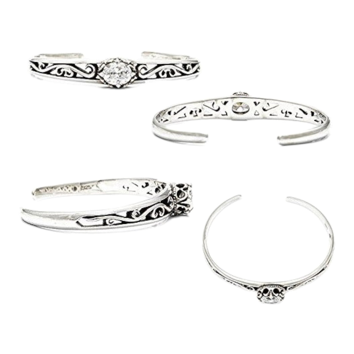Truelements Jewelry sterling silver bangle with arabesque filigree, crown motif, and oval clear zirconia stone.