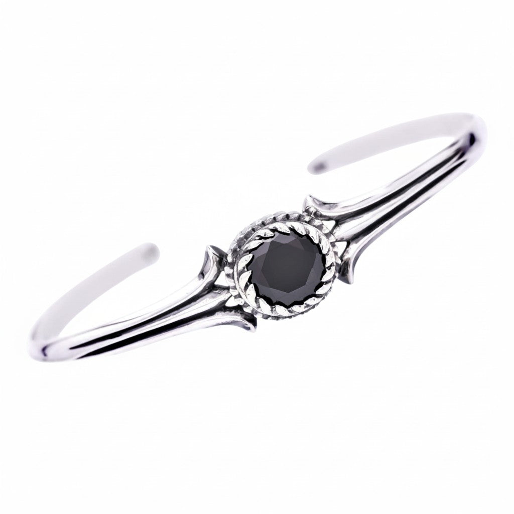 Truelements Jewelry unisex sterling silver bangle featuring a central 8mm black cubic zirconia stone with oxidized finish