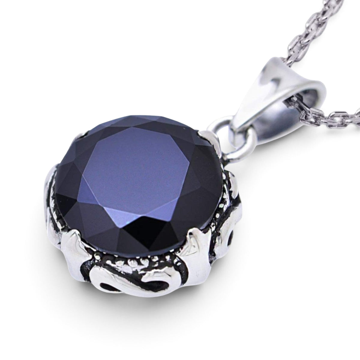 Truelements Jewelry sterling silver pendant featuring a large black zirconia stone in an ornate arabesque crown setting