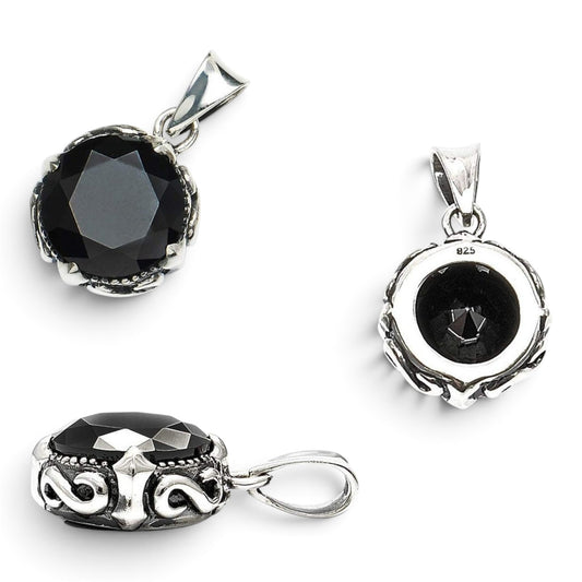 Truelements Jewelry sterling silver pendant featuring a large black zirconia stone in an ornate arabesque crown setting