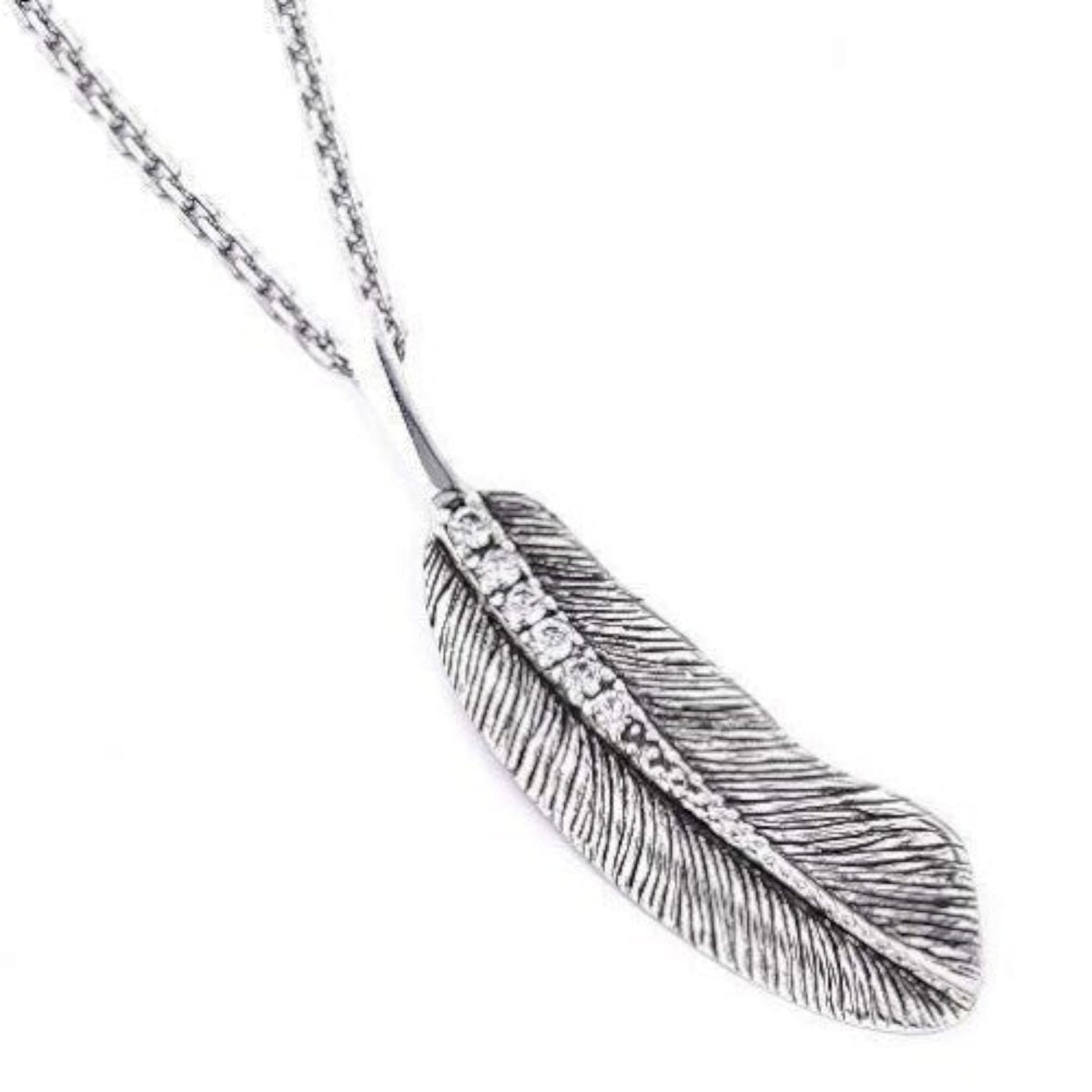 Truelements Jewelry sterling silver feather pendant with clear cubic zirconia accents and oxidized detailing.