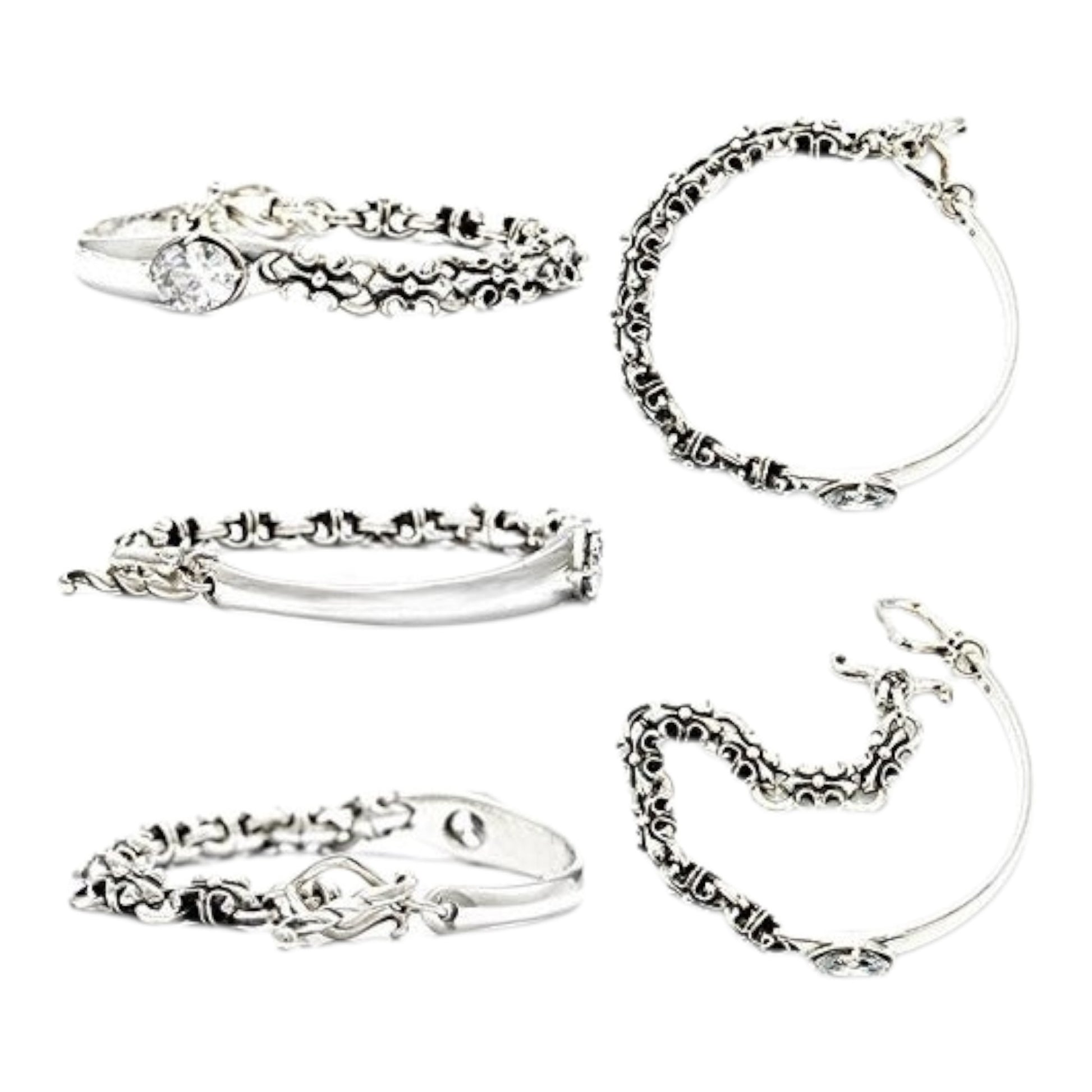 Truelements Jewelry sterling silver bangle featuring a fleur-de-lis motif, clear cubic zirconia, and oxidized finish.