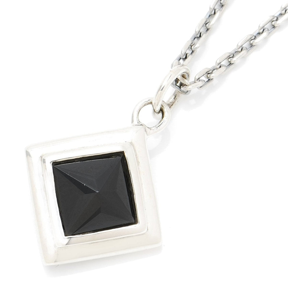 Truelements Jewelry silver 925 pendant featuring a square pyramid-cut black cubic zirconia in a geometric frame.