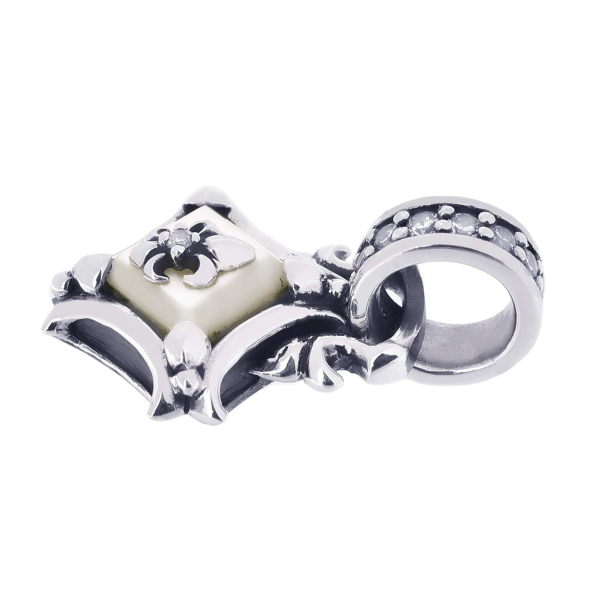 Truelements Jewelry sterling silver cross pendant featuring a square white shell inlay and clear zirconia accents.