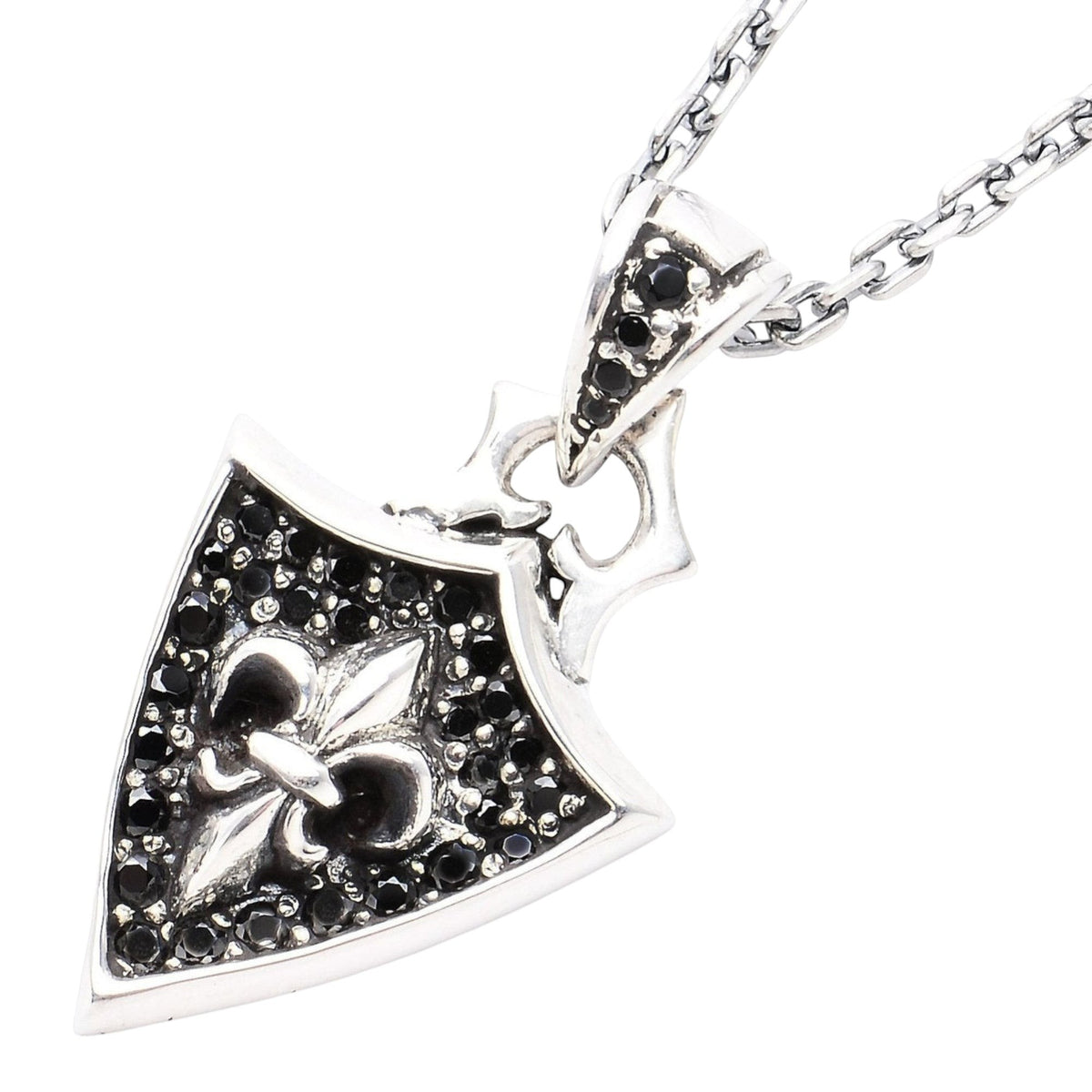 Truelements Jewelry sterling silver shield pendant featuring a fleur-de-lis, cross, and black cubic zirconia stones.