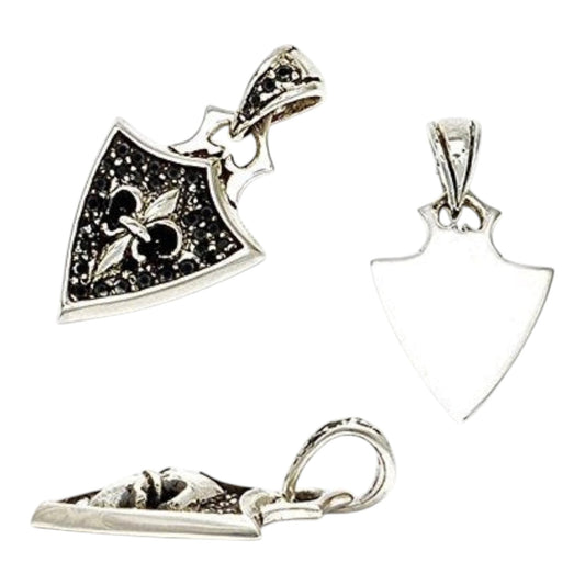Truelements Jewelry sterling silver shield pendant featuring a fleur-de-lis cross and black cubic zirconia stones