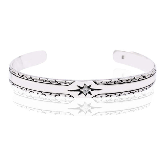 Truelements Jewelry sterling silver 925 men's bangle featuring a sun motif with a clear cubic zirconia stone.