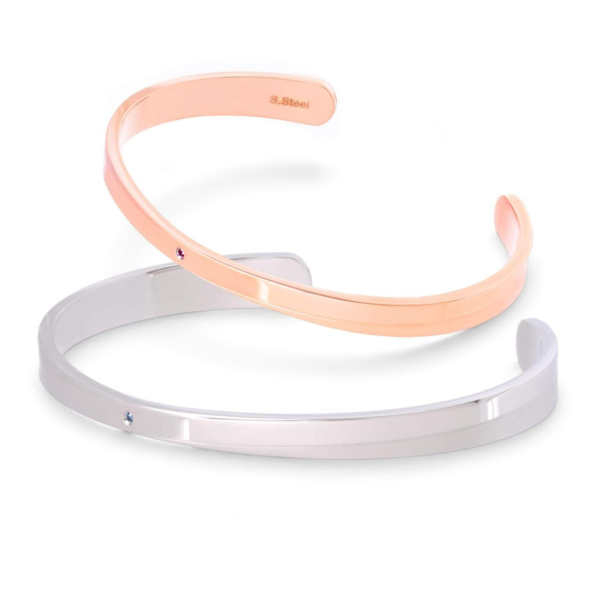 Truelements Jewelry surgical stainless steel bangles in silver and rose gold tones with small inset gemstones