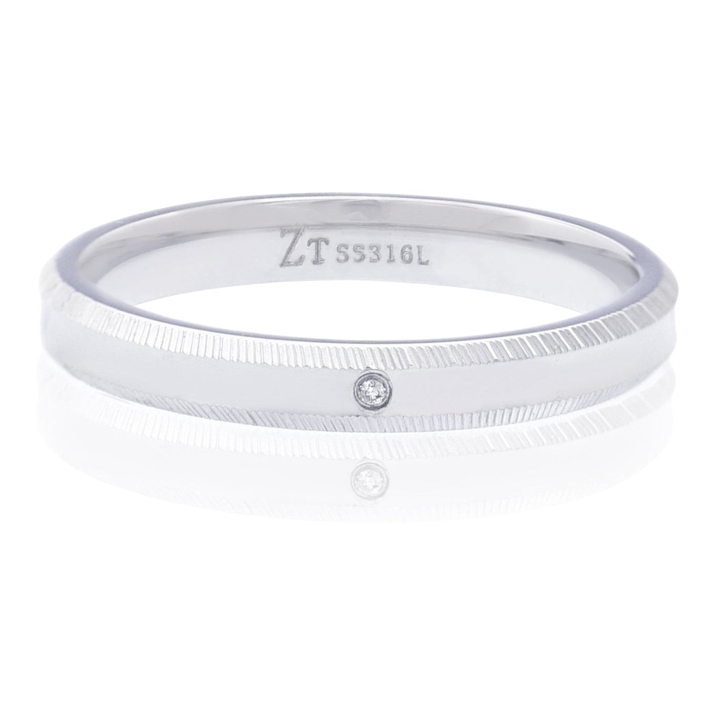 Truelements Jewelry silver 316L stainless steel ring with a central white diamond and textured edge detailing.