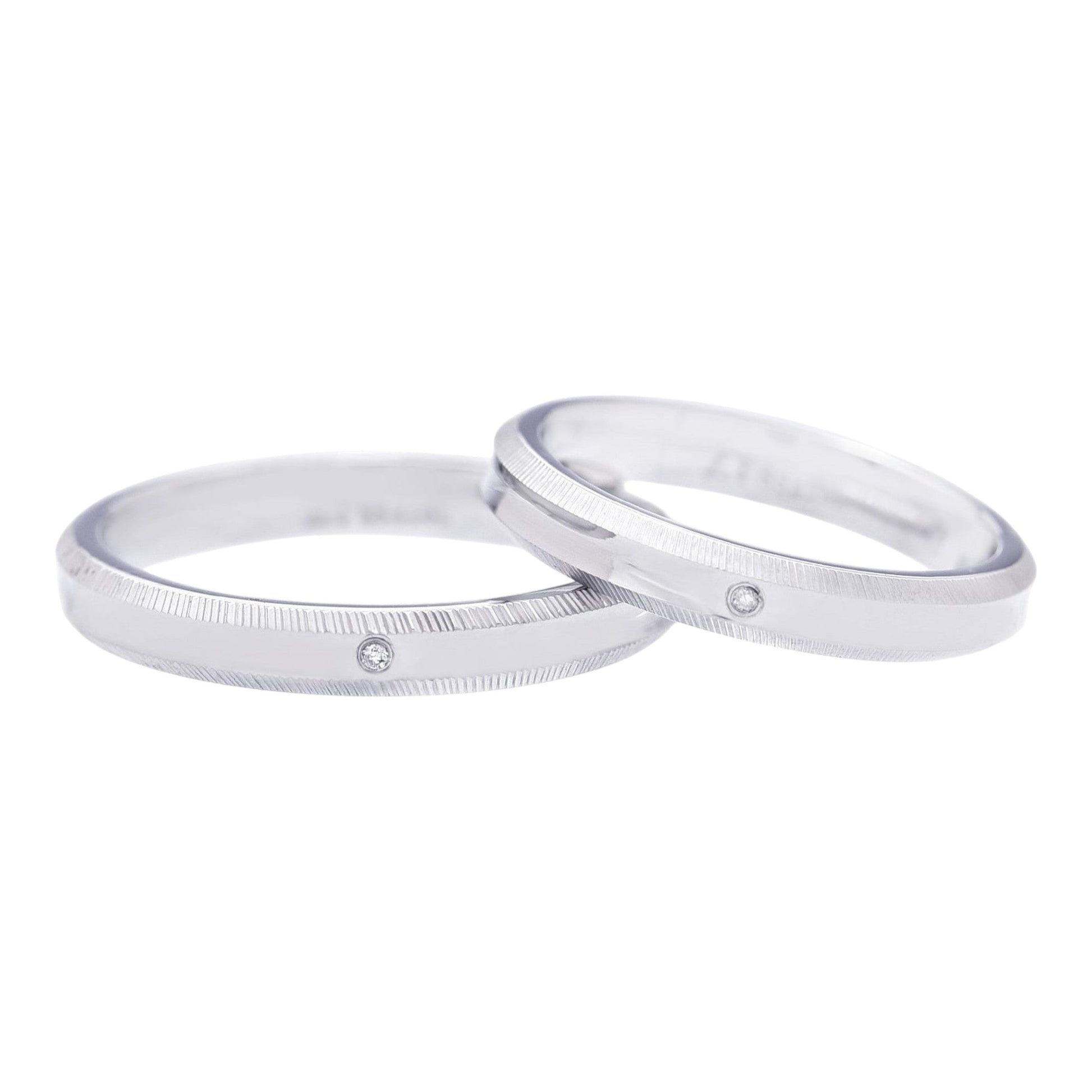 Truelements Jewelry stainless steel couple rings with white diamond accents and textured edge detailing