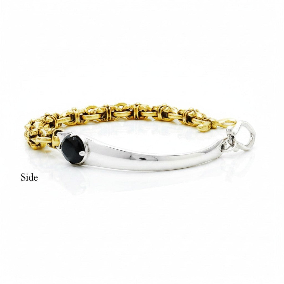 Truelements Jewelry two-tone bracelet featuring sterling silver, gold-tone brass, and an oval black cubic zirconia.
